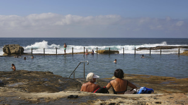 Bathers enjoy the sunshine at Mahon Pool in Sydney's east on Sunday.
