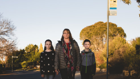 Melanie Wilson says she will have to change her work hours to drive her two children Molly 11, and Ben 8 (right) to school if their neighbourhood loses its dedicated school bus.