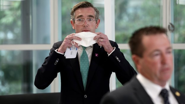 Then-premier Dominic Perrottet with his deputy Paul Toole at the Homebush vaccination hub in October 2021.