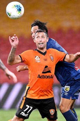 Scott McDonald playing in front of empty Suncorp Stadium seats last season.