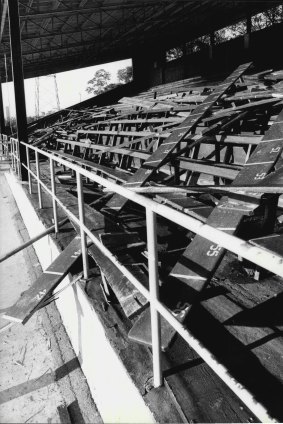 Seating in the grandstand of Cumberland Oval was torn from mountings and piled high before being set a light.