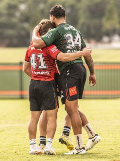 Latrell Mitchell embraces his No. 1 replacement Jye Gray.