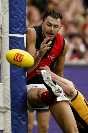 Bombers ruckman Sam Draper sneaks a goal in from a tight angle in the third quarter.