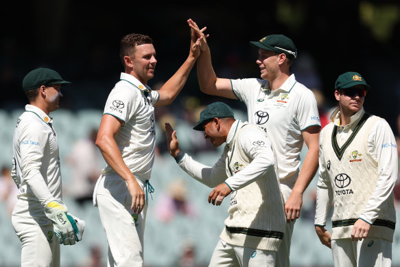 Josh Hazlewood celebrates the wicket of Tagenarine Chanderpaul on Thursday.