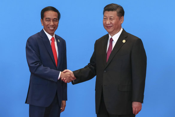 Indonesia’s President Joko Widodo has accepted a Chinese offer to resurface a sunken submarine and allowed joint military exercises between the nations’ navies. He is pictured here with Chinese President Xi Jinping in 2017. 