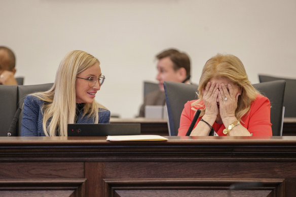 Democrat Lauren Brook, left, pictured in the Florida Senate in February talking with Senator janet Cruz, says she wept when she heard about the draft decision.  
