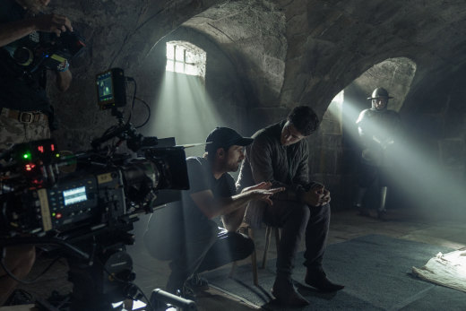 Director David Michod on the set of The King, with Timothy Chalamet as Hal, aka King Henry V.