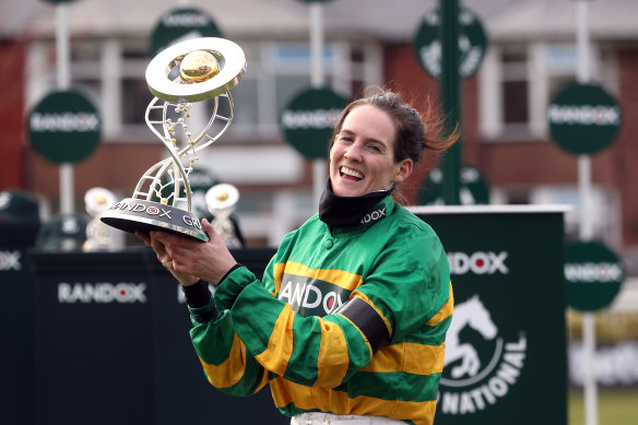 Rachael Blackmore with the Randox Grand National Handicap Chase trophy. 