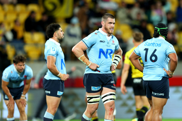 Fergus Lee-Warner of the Waratahs looks on. 