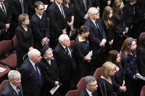 Former prime ministers (middle row R-L) Scott Morrison with wife Jenny, John Howard with wife Janette, and Paul Keating at the service.