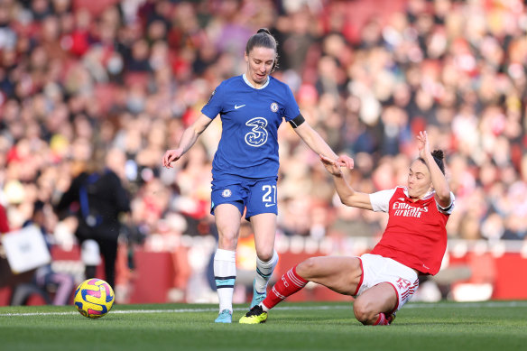 Arsenal’s Australian defender Caitlin Foord tackles Chelsea’s Niamh Charles at the Emirates Stadium on Sunday.