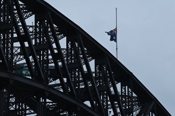 The Australian flag at half mast on the Sydney Harbour Bridge.