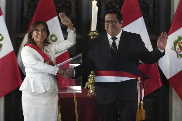 Peru President Dina Boluarte and her newly named Economy Minister Alex Contreras at the swearing-in ceremony.