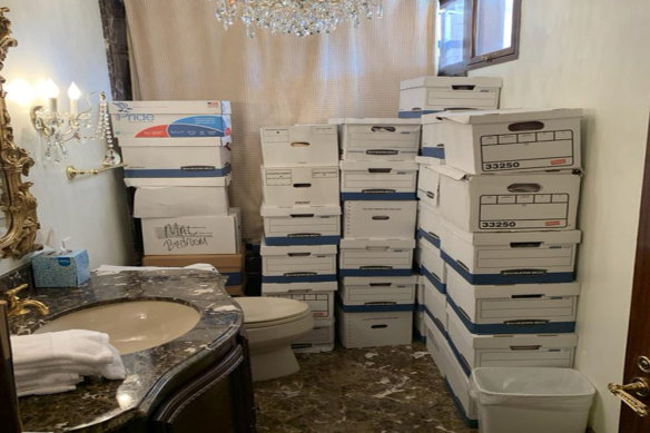 This image, contained in the indictment against former President Donald Trump, shows boxes of records stored in a bathroom and shower in the Lake Room at Trump’s Mar-a-Lago estate in Florida.