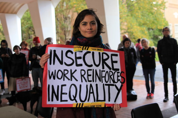 A protester in support of better working conditions for Melbourne University's casual staff in May. 
