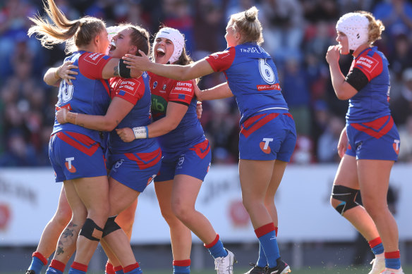 The Knights celebrate after winning their semi-final against the Broncos.