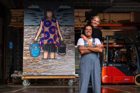 Artists Blak Douglas and friend, fellow artist Kim Leutwyler, drop off their Archibald entries at the Art Gallery of NSW. Blak Douglas’s entry of Lismore artist Karla Dickens, is behind titled Moby Dickens.
