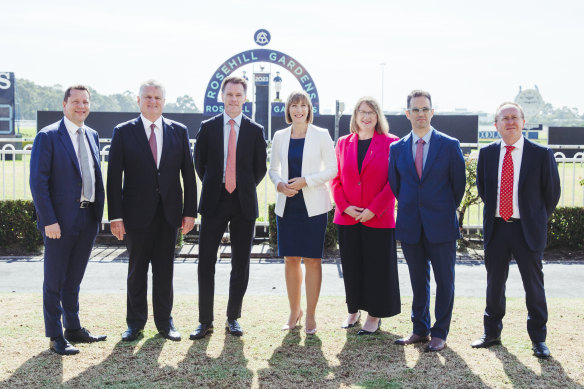 Dealmakers: Planning Minister Paul Scully, ATC chairman Peter McGauran, Premier Chris Minns, Transport Minister Jo Haylen, Parramatta MP Donna Davis, Treasurer Daniel Mookhey and Sydney Metro chief executive Peter Regan.