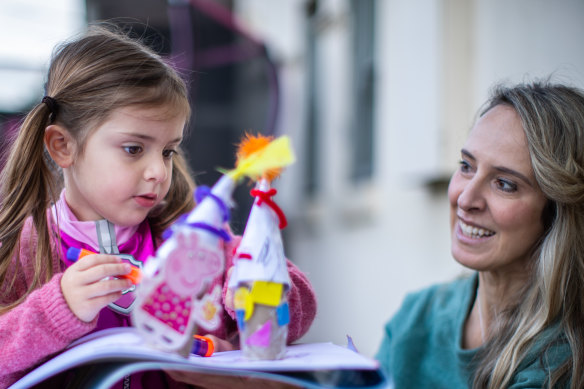 Sally Franco and daughter Ruby, who  has been 'attending' free art classes live-streamed on Facebook.
