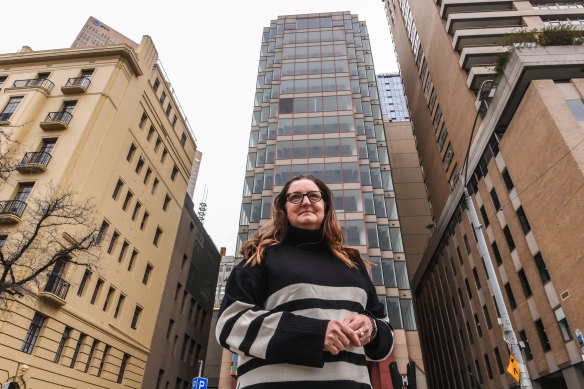 Ingrid Bakker from design studio Hassell in front of 85 Spring Street, an unoccupied building identified as suitable for co<em></em>nversion to housing.