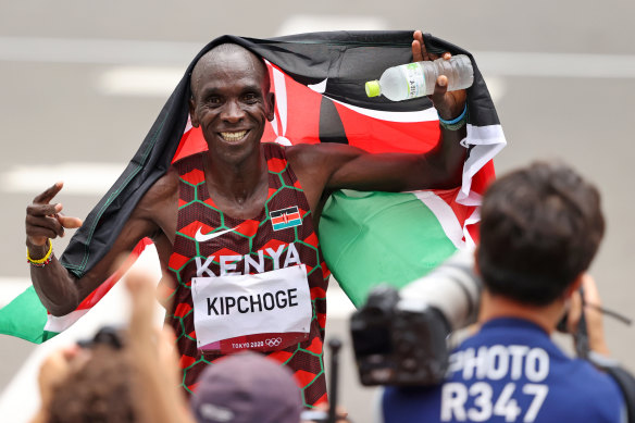 Kenyan Eliud Kipchoge celebrates winning back-to-back Olympic gold medals in the men’s marathon. 