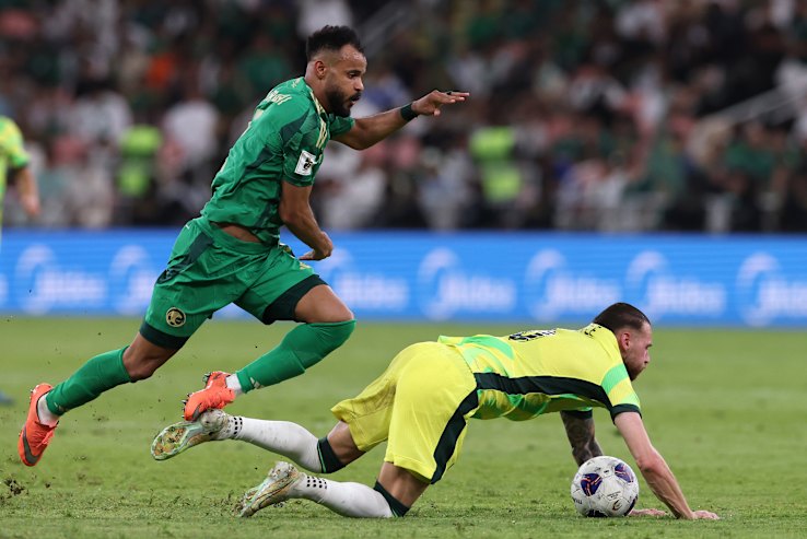 Ali Majrashi's foul on Martin ⁢Boyle during the Australia-Saudi Arabia match. VAR played ‍a pivotal role in overturning‍ the red card.