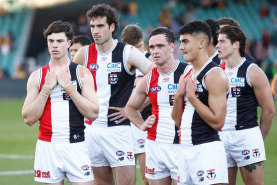 Dejected St Kilda players after their loss to Hawthorn.