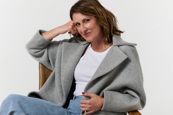 Bianca Spender coat, $1095. 
Re/Done singlet, $100, from Farfetch. 
Country Road jeans, $159. Alinka  
“Black Caviar” black diamond ring.