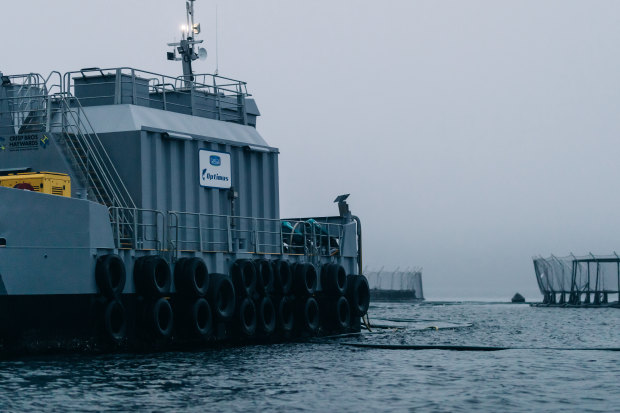 A feeding barge at the Tassal salmon farm on the D’Entrecasteaux Channel houses a diesel plant that powers automated fish feeding. Noise from the site causes distress for the nearby Killora community.