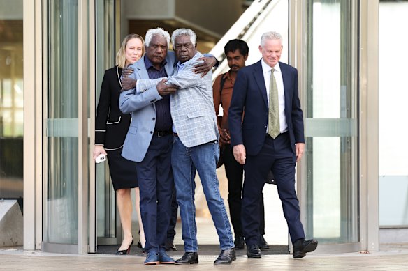 Gumatj elders Balupalu Yunupingu and Djawa Yunupingu leave the High Court of Australia after a historic victory for Indigenous elders from Arnhem Land. 