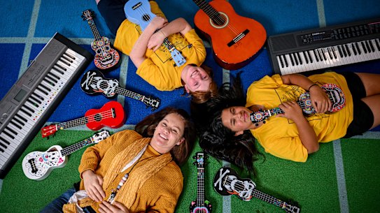 Berwick Lodge Primary School music teacher Lorraine Montgomery with students Genny (long dark hair) and Grace at their music room.