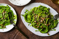 Peruvian-inspired green spaghetti with smoked almonds.