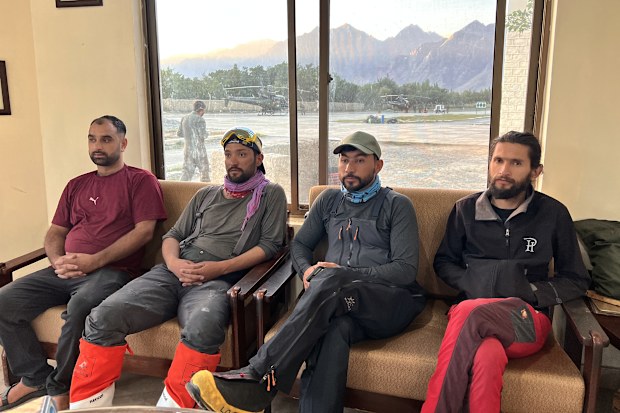 Members of a mountaineers rescue team prepare to depart from an airbase on a search operation for climbers missing after an avalanche on Pakistan’s Broad Peak on Friday, July 31.