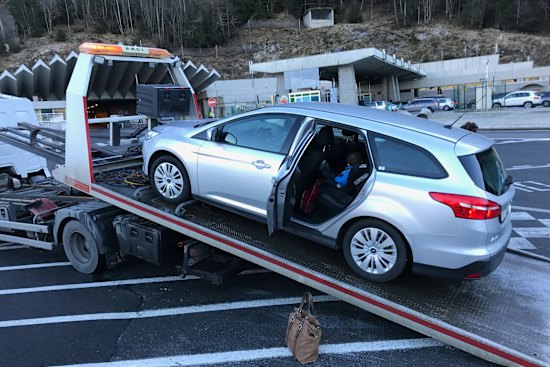 Michelle Cazzulino’s hire car on the tow truck near the entrance to the Mount Blanc Tunnel. She and her two younger children were taken down the mountain in the back of the car.