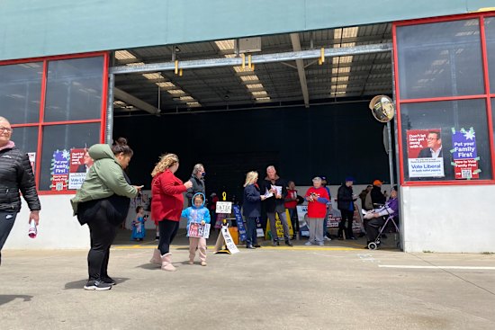 Melton voters at an early voting centre housed in a disused Bunnings Warehouse on Tuesday.