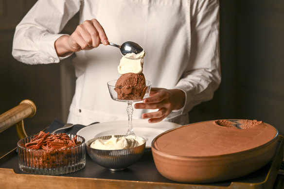The chocolate mousse is served tableside.