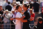 Zverev and Jakub Mensik embrace at the net after their semi-final.