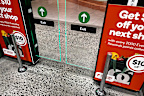 Woolworths self-checkout exit gates continue to roll out across the country.
