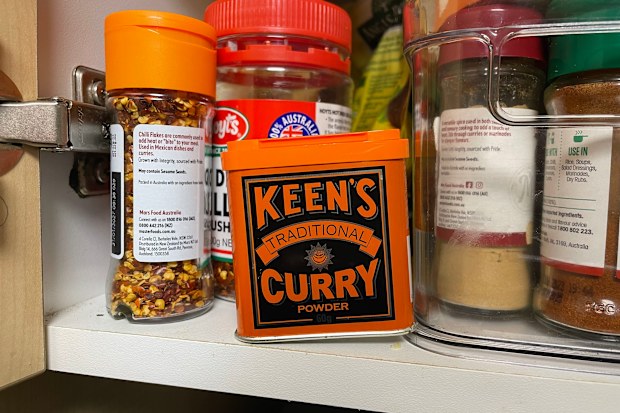 A tin of Keen's Traditional Curry Powder in a pantry