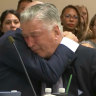 Alec Baldwin breaks down as judge dismisses charges against him in Rust killing