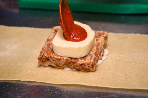 Wagyu bolognese lasagne is topped with fior di latte mozzarella.