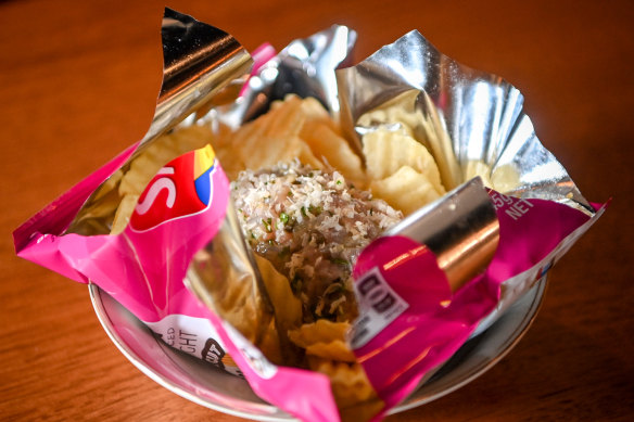 Tuna tartare in a bag of Smiths crisps is on the menu at Punters Club.