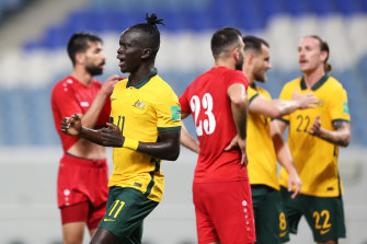 Awer Mabil celebrates what proved to be the winner for Australia near the 70-minute mark.