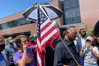 The Reverend Jesse Jackson outside the office of Senator Kyrsten Sinema in Phoenix in July, protesting her opposition to ending the filibuster to pass voting rights legislation. 