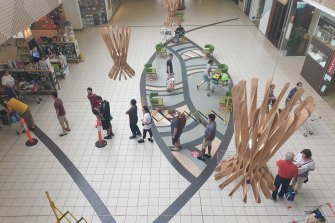 Greenslopes Plaza has a queue wrapping around to Coles.