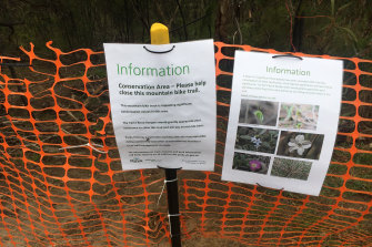 Temporary signs and fencing at Studley Park to protect a conservation area of wildflowers.