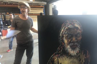 Artist Craig Ruddy dropping off his third portrait of David Gulpilil into the Archibald Prize in 2021.