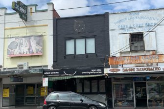 The Sydney Road venue in Coburg that’s been listed as a COVID-19 exposure site has a ‘for lease’ sign and material across the windows, unoccupied.