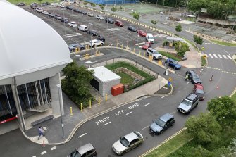 The newly-established COVID-19 testing site at the QUT Kelvin Grove campus in inner-Brisbane. The queue stretched out a multi-storey carpark, through an outer carpark and onto Herston Road.