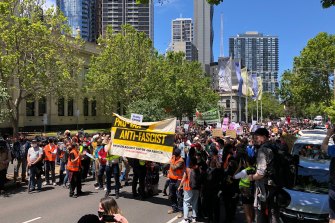 The ‘pro-vax, anti-fascist’ rally in Melbourne moves down Lygon Street last Saturday.